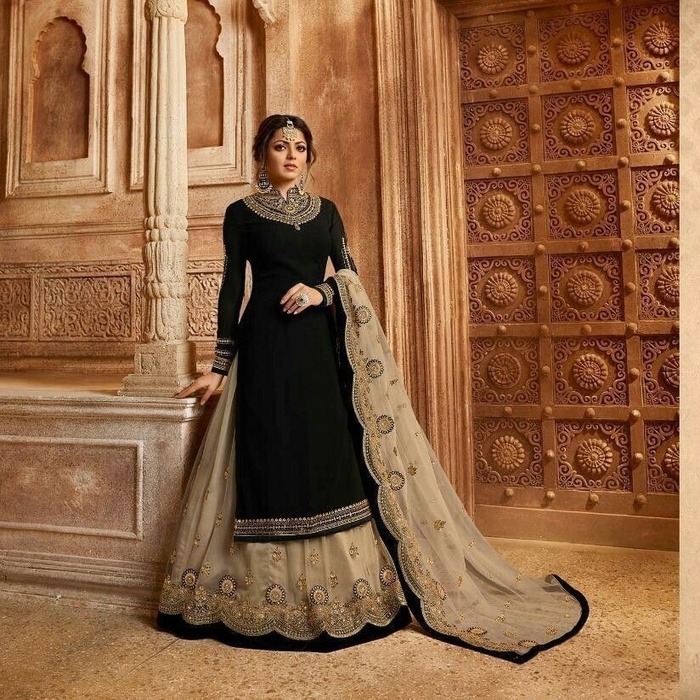 Black & cream Glamour & Glorious New Design Heavy Embroidery Work Semi-stitched Four Piece Gown .